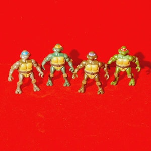 Teenage mutant ninja turtles 2002 set of 4.