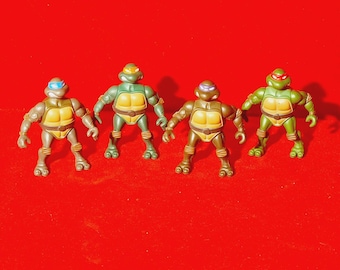 Teenage mutant ninja turtles 2002 set of 4.