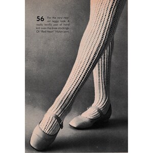 May include: A pair of white crocheted over-the-knee stockings. The stockings are knitted in a lacy pattern and are worn with white shoes. The text "For the very new-est leggy look: A really terrific pair of hand knit over-the-knee stockings. Of "Red Heart" Nylon yarn." is printed on the image.
