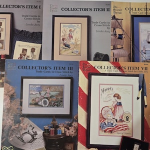 May include: A collection of vintage cross-stitch trade card books by Linda Jury. The covers feature framed illustrations of children and nautical themes. Titles include "Collector's Item I, II, III, V, and VII". The Scarlet Thread is the publisher.