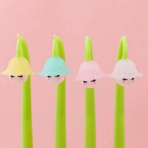 Stylo Gel en Silicone Muguet (aléatoire), 1 pièce, stylo à encre noire, modélisation douce, écriture lisse et facile, papeterie scolaire et de bureau coréenne