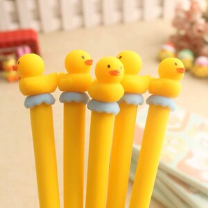 1 pcs Lovely Yellow Ducks Silicone Gel Pen Rollerball School Office Supply Stationery Black Ink 0.5mm
