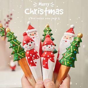 1 pcs Mignon Dessin animé Père Noël Forme Gel Pen Bois Sculpture Stylo Artisanat Cadeau Stylo Étudiant Signature Stylo Arbre de Noël Bonhomme de Neige
