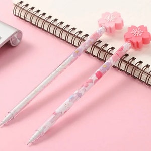 1 juego (2 piezas) Cherry Blossom Rain series gel pen estudiantes con 0.5 pull cap tubo de aguja completo pluma de agua negra linda forma pluma de firma lisa