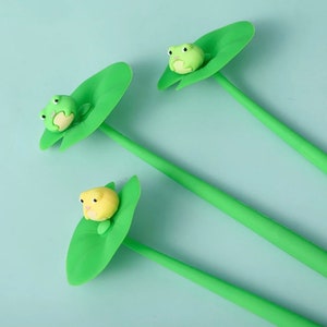 1 Pcs Korean Cute Funny School Pens Lotus Leaf Frog Kawaii Stationery Ballpoint Blue Rollerball Office Accessory Kit Goods Thing