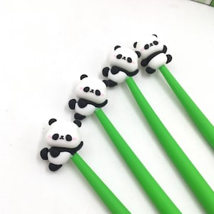 1 piezas Cartoon Panda Lindo Kawaii Papelería Tinta Negra 0.5mm Gel Pluma Escolar Útiles de Oficina Regalo Encantador Para Niños Kawaii Suministro de Escritura