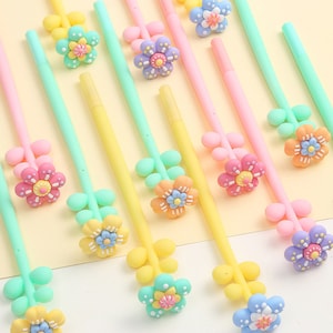 1 Stück Süße wundervolle kleine Blume (zufällig) Silikon Gel Stift Weich Modellieren Schwarze Tusche Stift Glatt Einfach Schreiben Büro Schule Schreibwaren Korea