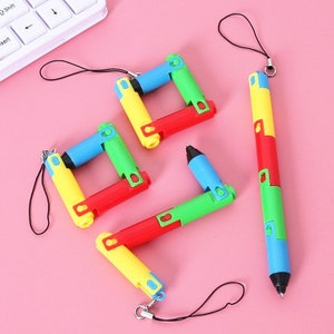 1pc bolígrafo plegable pluma deformación pluma coreana creativa papelería de escuela primaria novedad Lindo regalo para niños
