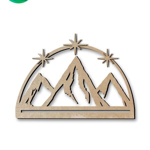Puede incluir: Un recorte de madera de una cordillera con tres picos y tres estrellas arriba. Las montañas están delineadas en negro y las estrellas son estrellas simples de cinco puntas.