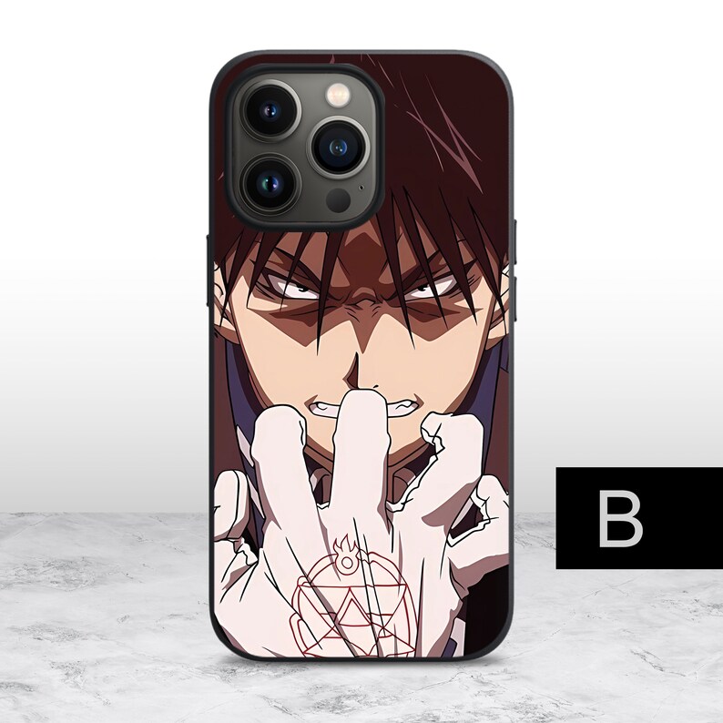 May include: Black iPhone case with a close-up image of an anime character with dark hair and red eyes. The character is making a fist with a red symbol on their hand.