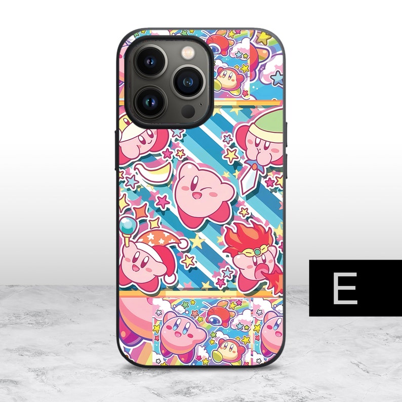 May include: A black iPhone case with a colorful design featuring a pink cartoon character with stars and stripes. The case has a cutout for the camera lens.