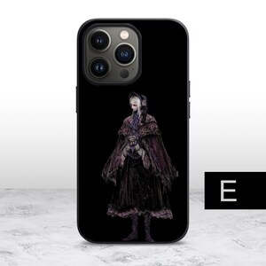 May include: Black phone case with a design of a woman in a long, dark dress and a hood. The woman is standing on a black background. The phone case has a camera bump with three lenses.