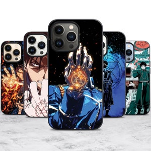 May include: Four different phone cases featuring anime characters from the Fullmetal Alchemist series. The cases are black with a variety of designs, including a character with a glowing hand, a character with a sword, and a character with a symbol on their chest.