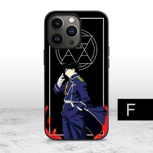 May include: Black phone case with a white and black illustration of an anime character with a black background. The character is wearing a blue and black uniform with a white collar and a white glove. The character is standing in front of a white circle with a black triangle inside. The text "F" is in the bottom right corner of the image.