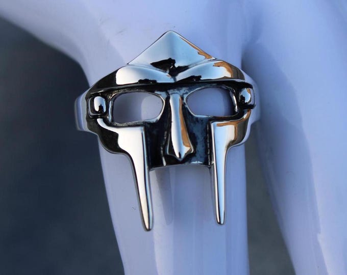 Featured listing image: Silver MF DOOM Ring,Unique Holiday Gift,Villain Mask Ring For Men, Silver Gladiator Ring, Rapper Ring,Christmas Gift, Made by Rivika Designs