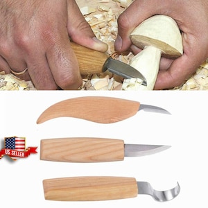 May include: A wood carving set featuring three different knives with wooden handles and stainless steel blades. The image shows a person using one of the knives to carve wood. The set includes a curved knife, a straight knife, and a hook knife.