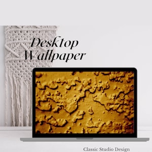 Può includere: Un computer portatile che mostra uno sfondo desktop con un design astratto testurizzato in tonalità dorate. Il testo "Desktop Wallpaper" è visualizzato sopra il laptop.