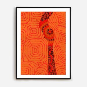 May include: Framed abstract art print. The artwork has an orange background with a repeating geometric pattern. A vertical, winding shape in red and brown provides contrast. The print is in a black frame, suitable for various interiors.