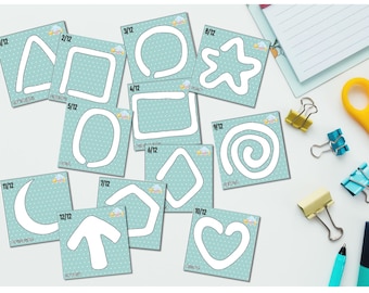May include: A collection of twelve square cards with white outlines of shapes, including a triangle, square, circle, and heart. Each card has a light blue background with white polka dots and a number indicating its sequence. Stationery items like paper, scissors, and binder clips are also visible.