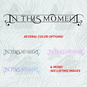 May include: A digital download of a printable design for a wall decal that says "In This Moment" in a decorative script font. The design is shown in black, blue, pink, and purple. The text "Several Color Options!" and "& More! See Listing Images" is also included in the image.