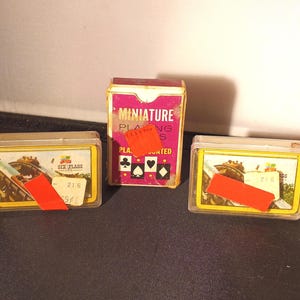 Vintage Whitman-minispeelkaarten nr. 8150 en twee ongeopende minikaarten met vintage six flags op kaarten uit Midden-Amerika