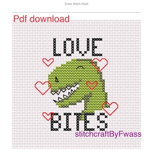 May include: Cross stitch pattern featuring a green dinosaur with the words "LOVE BITES" and hearts. The pattern is 50 stitches by 50 stitches.