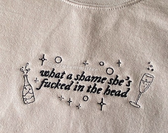champagne problems embroidered sweatshirt