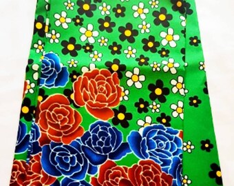 Wax fabric, floral pattern, green background, from 50cm / 116cm wide. Ankara Fabrics