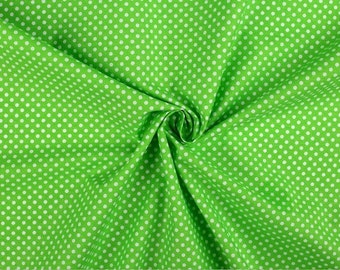 Cotton fabric with pretty pastel green dots from 50cm, 2 widths to choose from (80cm or 160cm wide).