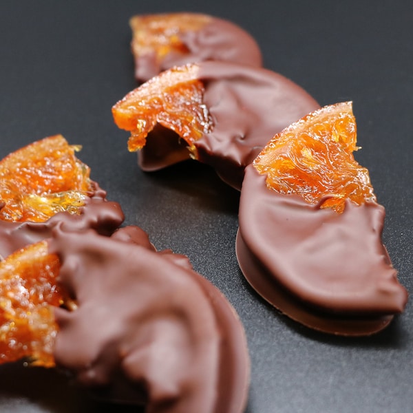 Organic Peony "Orange Moon". Candied orange dipped in artisan, bean to bar 70% Peony Dark Chocolate.
