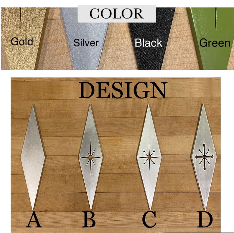 May include: Four diamond-shaped metal ornaments with different starburst designs. The ornaments are labeled A, B, C, and D. The ornaments are shown against a wood background. The top of the image shows four color swatches labeled Gold, Silver, Black, and Green.