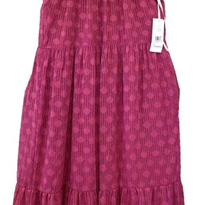 May include: A magenta midi dress with a textured geometric pattern. The dress has a smocked neckline, short flutter sleeves, and a tiered skirt. A tag with the number 10 is attached.