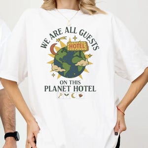 Eco-Positive Unisex Tee - &#39;We Are All Guests on This Planet Hotel&#39;, Sustainable Statement Shirt, Earth-Love Apparel, Eco-Friendly [...]
