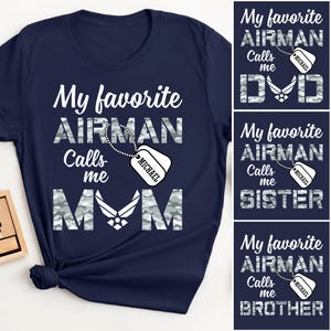 May include: A navy blue t-shirt with the text "My favourite Airman Calls me Mum" in white and camouflage print. Includes a dog tag with the name "Michael". Additional shirts show "Dad", "Sister", and "Brother".