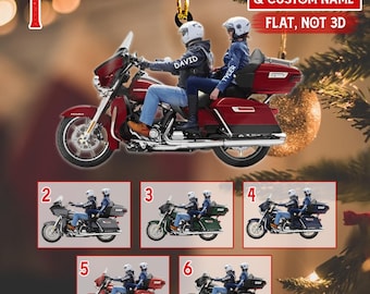 May include: A flat, custom-designed hanging ornament featuring a motorcycle with two riders wearing helmets. The riders' jackets are personalized with the names DAVID and TYLER. The text CHOOSE PIC & CUSTOM NAME and FLAT, NOT 3D is visible.