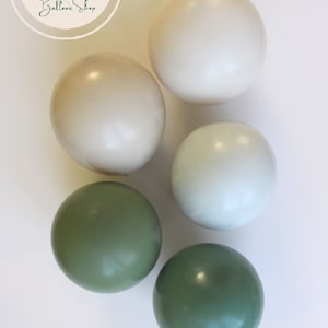 May include: A collection of balloons in various shades of green and beige. The balloons are arranged in a circle on a white background. The text "Vintage Green Collection" is written below the balloons.