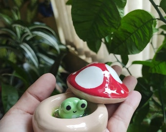 Mushroom house with froggy