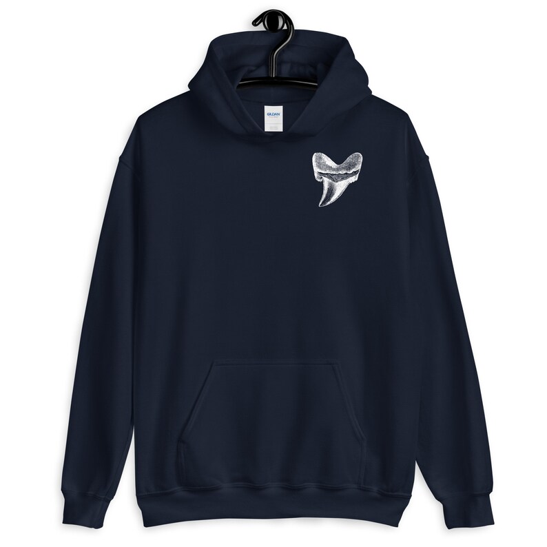May include: A navy blue hoodie with a white graphic of a large tooth on the front.
