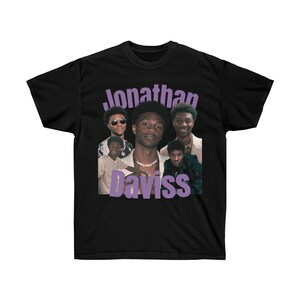 JONATHAN DAVISS Camiseta gráfica unisex / Jonathan Daviss Vintage Cuello redondo unisex