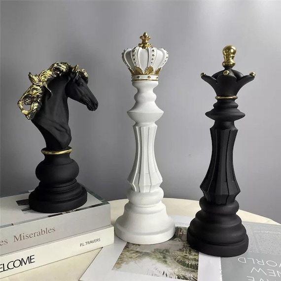 Golden Chess King In Front Of A Checkered Board Stock Photo