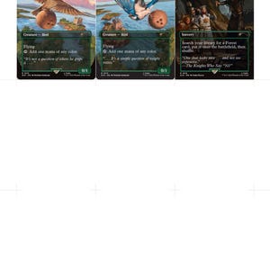 K&ouml;nnte beinhalten: Drei Magic: The Gathering Karten. Die ersten beiden zeigen Vogelillustrationen, betitelt mit "African Swallow" und "European Swallow". Die dritte Karte, "We Want... A SHRUBBERY!", zeigt eine Szene mit Figuren und Text.