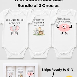May include: A set of three white baby onesies with playful graphics and text. Each onesie features a different design: an elephant, a group of animals, and a brain. The text includes "Too Cute to Be Artificial", "Cuteness Algorithm Activated", and "100% Human Intelligence".