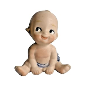 Vintage Kewpie-popbeeldje Bisque porselein zittend babyblauwe luier 2,5" hoog