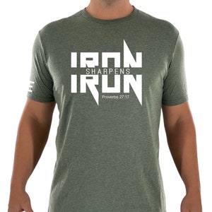 May include: A green t-shirt with a white graphic that says "Iron Sharpens Iron" and "Proverbs 27:17".