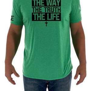 May include: A green t-shirt with a black box that says "THE WAY THE TRUTH THE LIFE" with a cross underneath.