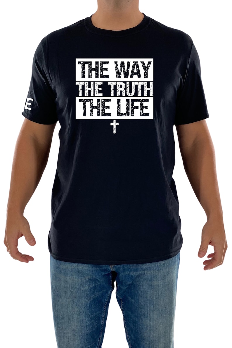 May include: A black t-shirt with a white graphic that says "THE WAY THE TRUTH THE LIFE" with a white cross underneath.