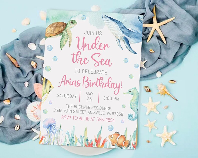 May include: An invitation to an "Under the Sea" themed birthday party for Arias. The invitation features a watercolor illustration of a whale, sea turtle, seahorse, and jellyfish. The text on the invitation reads "Join us Under the Sea to celebrate Arias Birthday! Saturday May 24 3:00 PM The Buckner Residence 2545 Main Street, Anisville, VA 87856 RSVP to Allie at 555-9854"