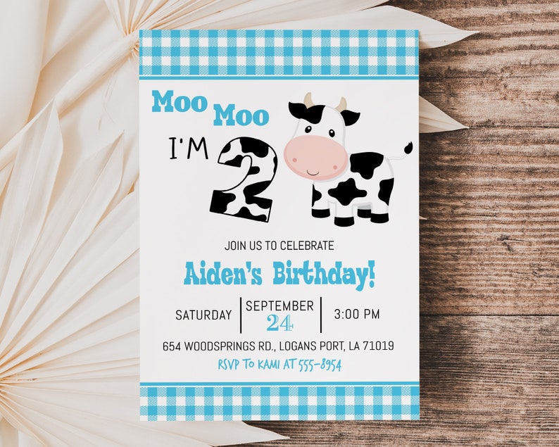 May include: A blue and white gingham birthday invitation featuring a cartoon cow and the text "Moo Moo I'm 2". The invitation is for Aiden's birthday party on 24th September at 3:00 PM. The address is 654 Woodsprings Rd., Logans Port, LA 71019. The RSVP information is "RSVP to Kami at 555-8954".