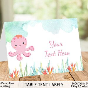 May include: Pink octopus table tent labels with a watercolor background. The text "Your Text Here" is on the label. Each tag measures 3.5 inches by 2.5 inches when folded.