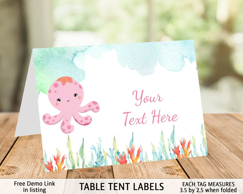 May include: Pink octopus table tent labels with a watercolor background. The text "Your Text Here" is on the label. Each tag measures 3.5 inches by 2.5 inches when folded.